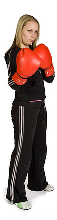 A woman boxer wearing a black track suit