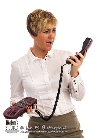 An angry business woman on phone