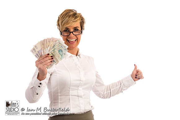 A succesful business woman with a handful of cash