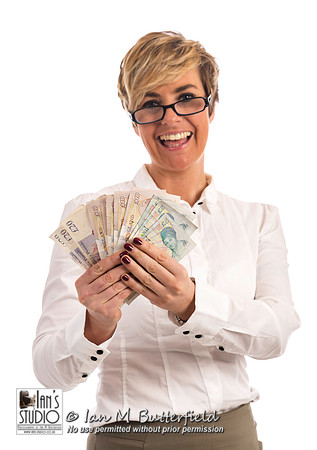 A succesful business woman with a handful of cash