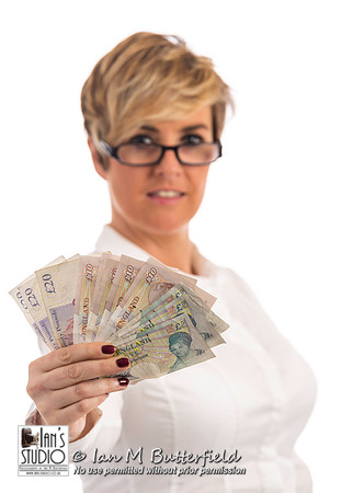 A succesful business woman with a handful of cash