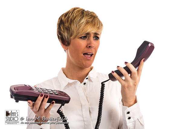 An angry business woman on phone