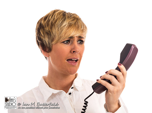 An angry business woman on phone