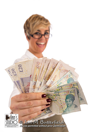 A succesful business woman with a handful of cash