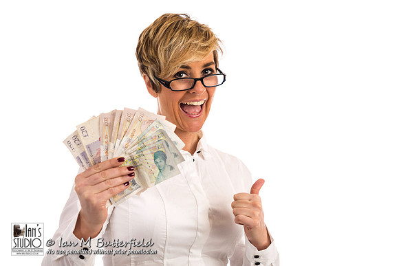 A succesful business woman with a handful of cash