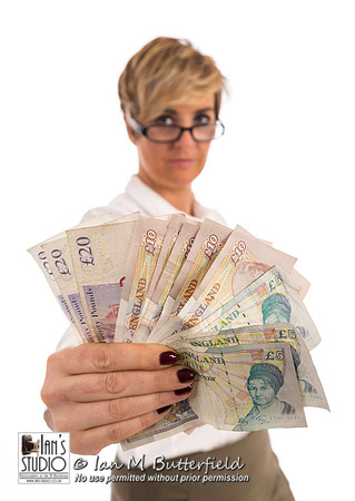 A succesful business woman with a handful of cash