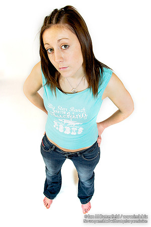 EY0219B-D00623 : A teenage girl showing defiance