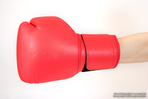 EY0219B-D00642 : Boxing glove on the hand of teenage female boxer