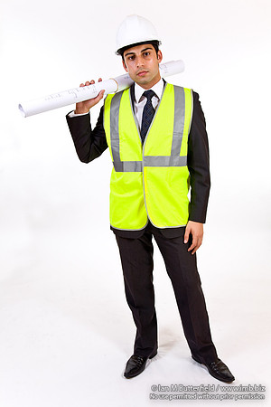 FA0718H-E08383 : Architect - man in hard hat high visibility jacket and holding plans