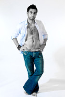 FA0718C-E07965-2 : A young man in jeans and an open shirt