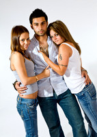 FA0718C-E07946 : A young man with his arms round two sexy young women