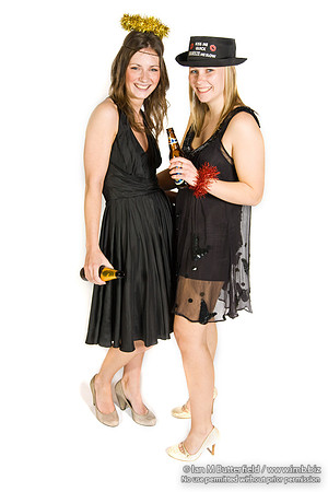 FA0308A-E02243 : Two party girls wearing black dresses and holding bottles of beer