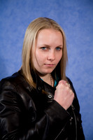 FA0308A-E02162 : Portrait of a woman wearing a leather biker jacket
