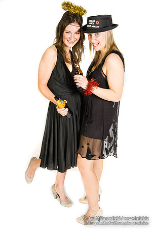 FA0308A-E02241 : Two party girls wearing black dresses and holding bottles of beer