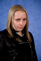 FA0308A-E02160 : Portrait of a woman wearing a leather biker jacket