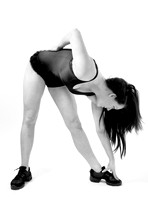 Attractive young woman doing stretches