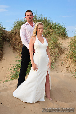 Wedding couple in the sand dunes.