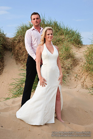 Wedding couple in the sand dunes.