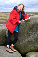 FB0902A-E05214 : Attractve blonde woman studies a map while out walking