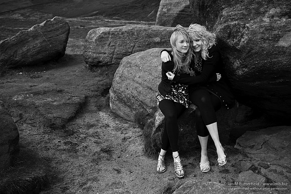 Two badly prepared blonde women lost on the hills in the rain