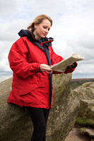 FB0902A-E05219 : Attractve blonde woman studies a map while out walking
