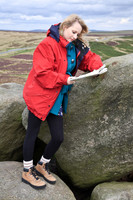FB0902A-E05213 : Attractve blonde woman studies a map while out walking