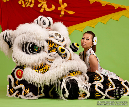 Chinese woman with dancing lion
