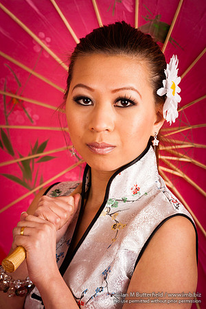Chinese woman with paper parasol