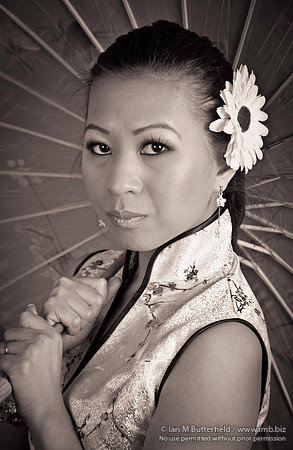 Chinese woman with paper parasol