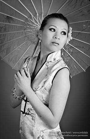 Chinese woman with paper parasol
