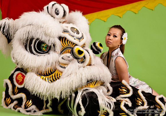 Chinese woman with dancing lion