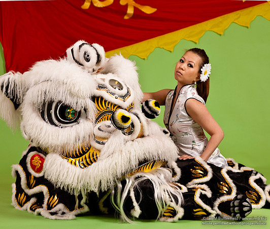 Chinese woman with dancing lion
