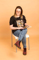 Mia reads a copy of Splosh magazine