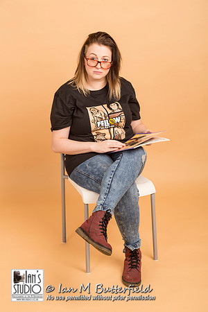 Mia reads a copy of Splosh magazine