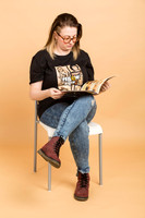 Mia reads a copy of Splosh magazine