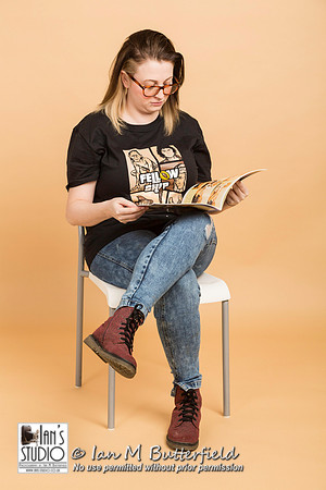 Mia reads a copy of Splosh magazine