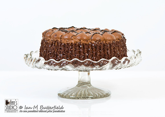 Chocolate gateau on a cake stand