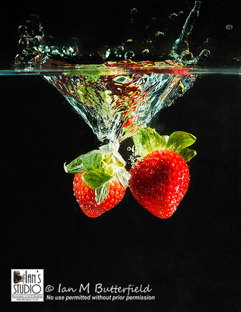 Strawberry dropped in to a tank of water